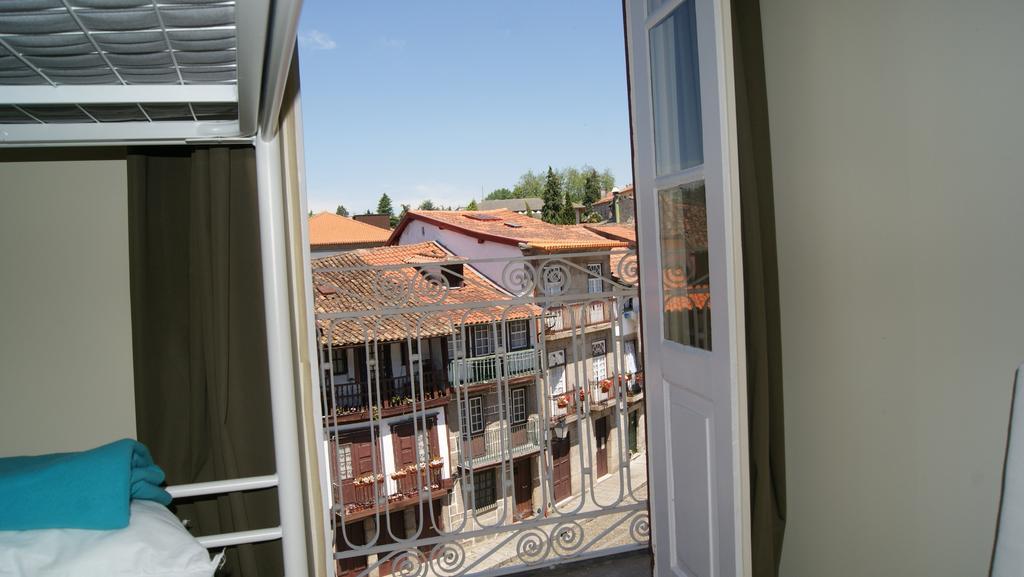 Santiago 31 Hostel Гимарайнш Номер фото